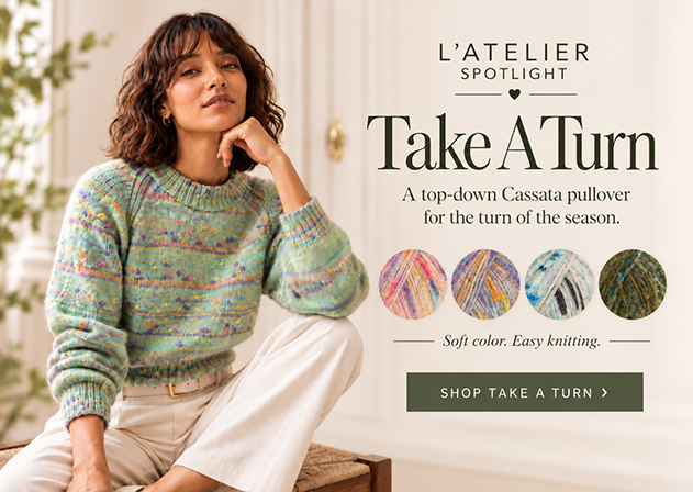  L’Atelier Spotlight homepage banner for Take A Turn featuring a model in a soft multicolor Cassata pullover with coordinating yarn colorways beside the sweater. 